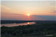 Missouri River Valley in front of a sunset. 