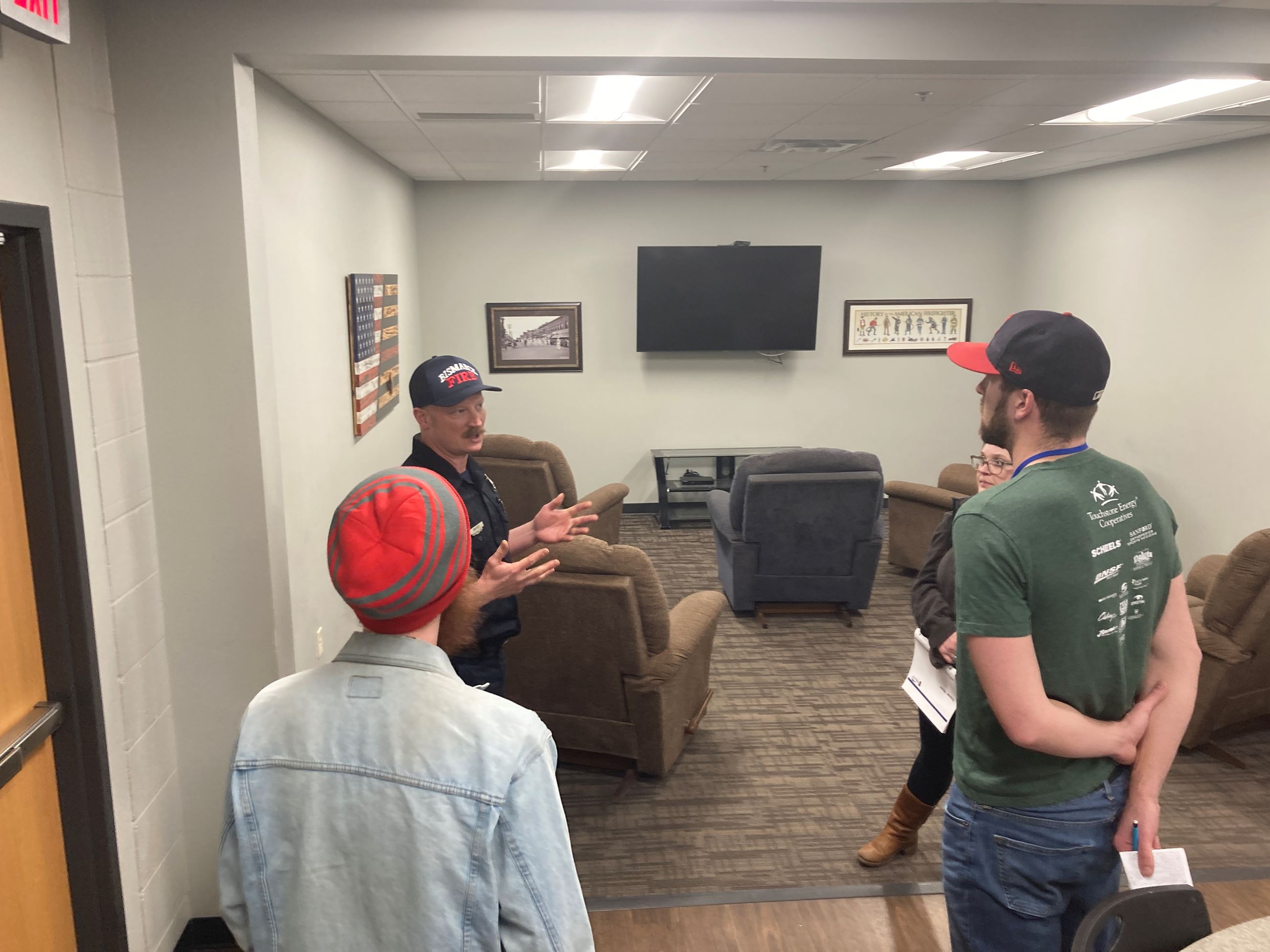 Citizen Academy tours a fire station's living quarters. 
