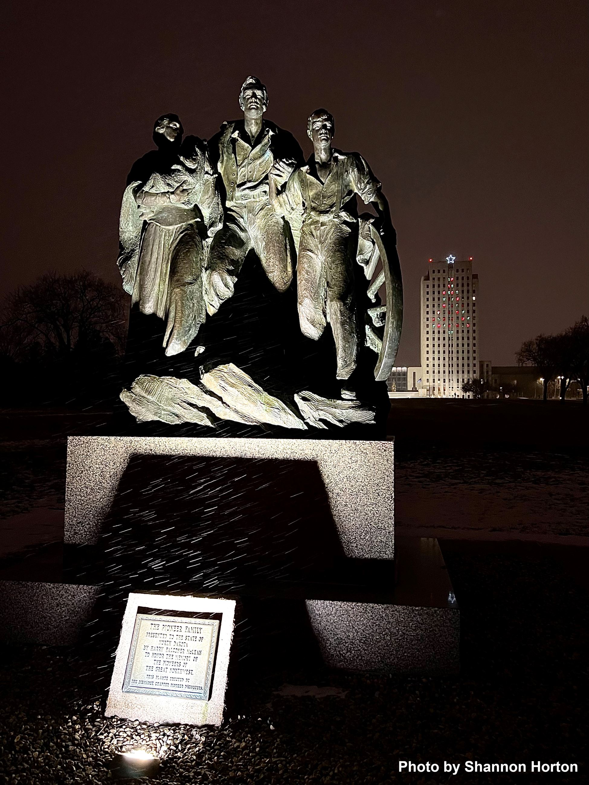 Pioneer Family bronze statue located outside the North Dakota State Capital. 
