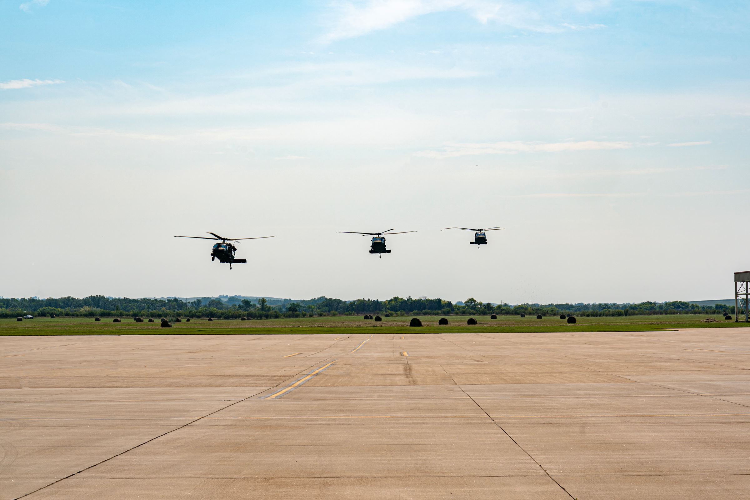 Helicopters return from a 40-minute trip for ESGR Patriot Award winners