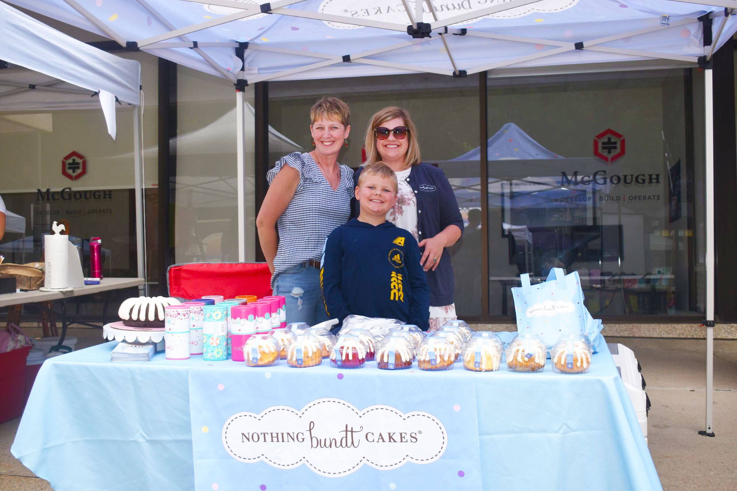 Staff from Nothing Bundt Cakes selling wares at the downtown street fair. 
